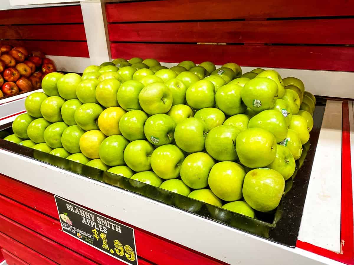 Granny Smith apples for sale in supermarket.