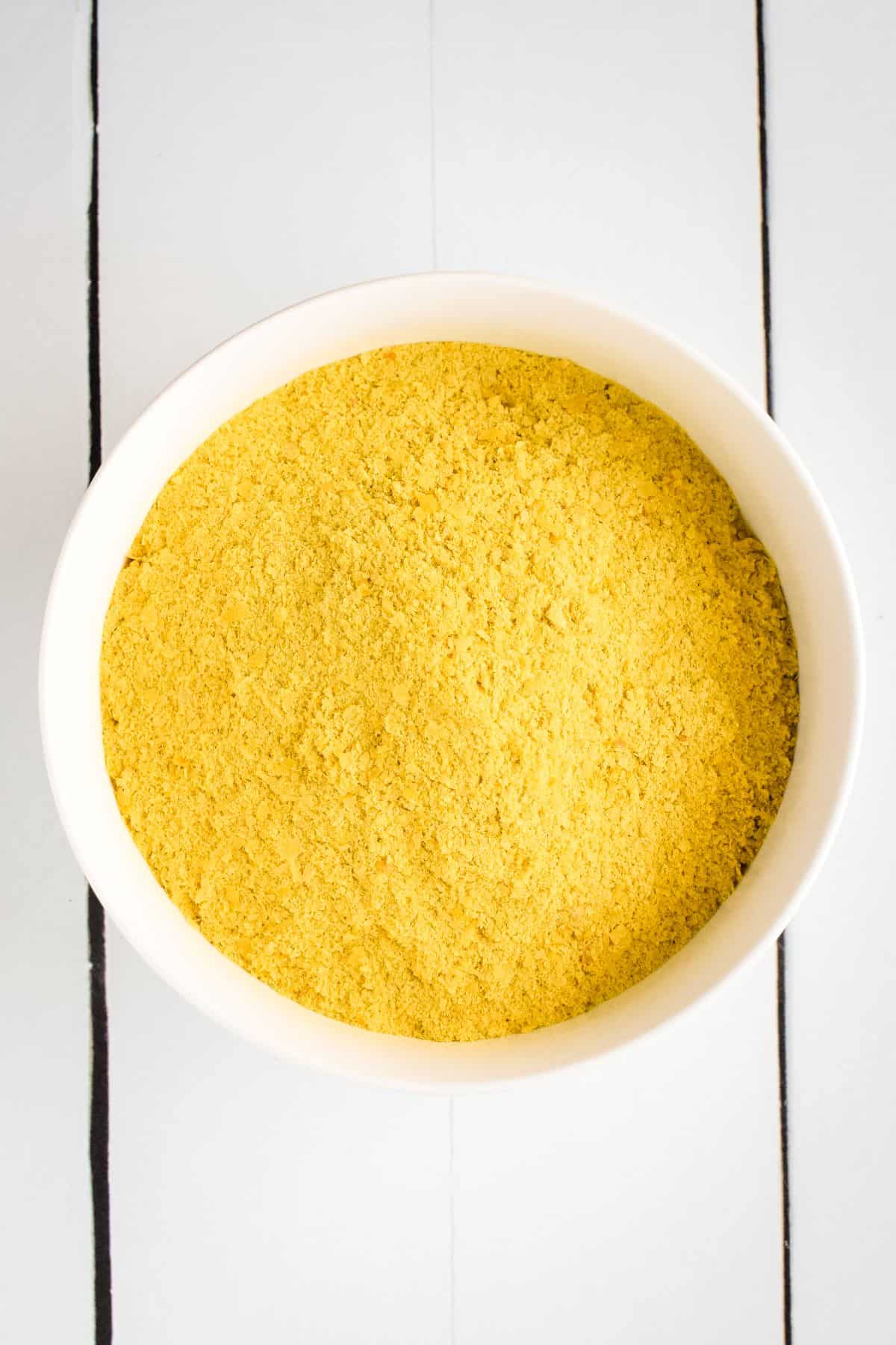Nutritional Yeast in a white bowl.