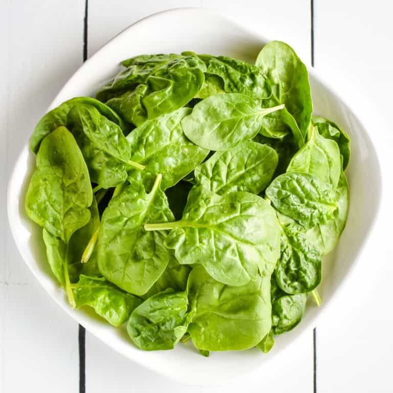 Spinach on a white plate.