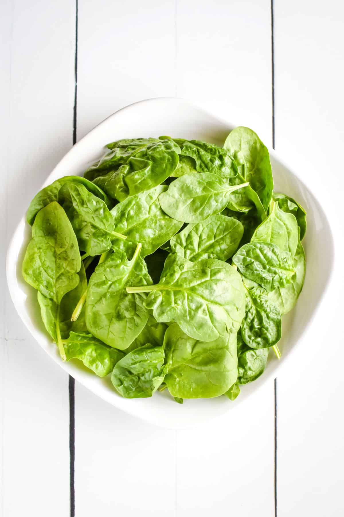 Spinach leaves on a plate.