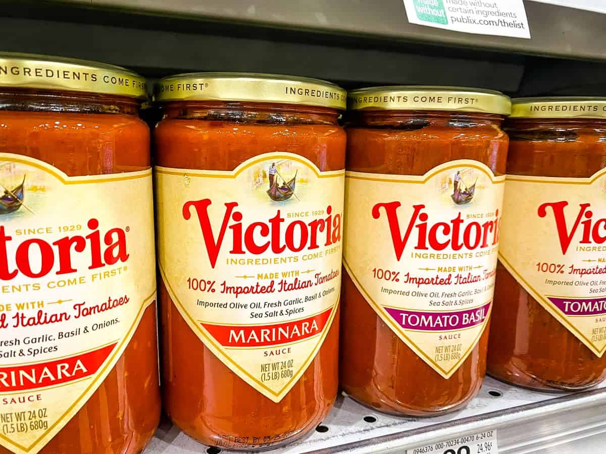 Jars of Victoria Tomato Sauce on shelf.