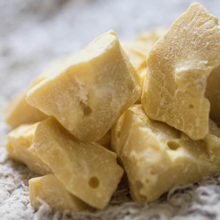 close-up of cocoa butter chunks on top of each other.
