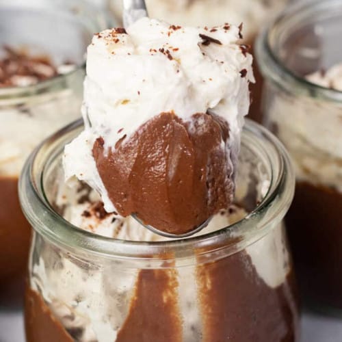 Vegan Chocolate Pudding in a jar and on a spoon.