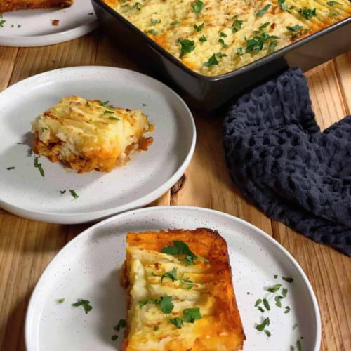 Vegan shepherds pie gluten free on a plate and in a baking pan.
