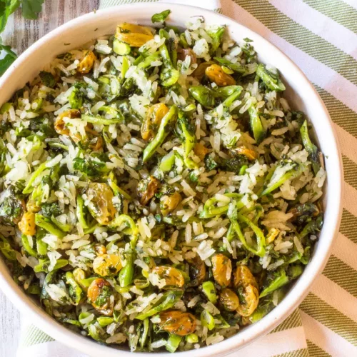 Green rice in a bowl.