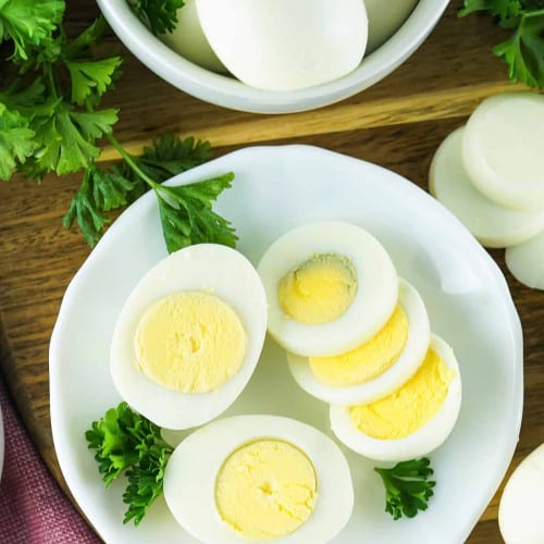 Hard boiled eggs on a plate.