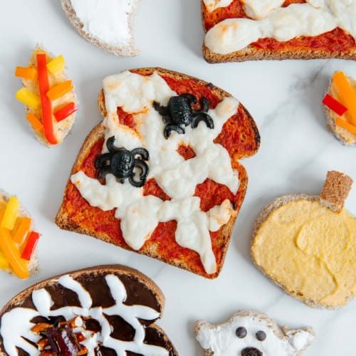 No-Waste Halloween Toasts on a marble surface.