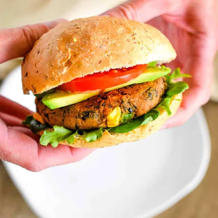 Holding a Sweet-Potato-Black-Bean-Burger