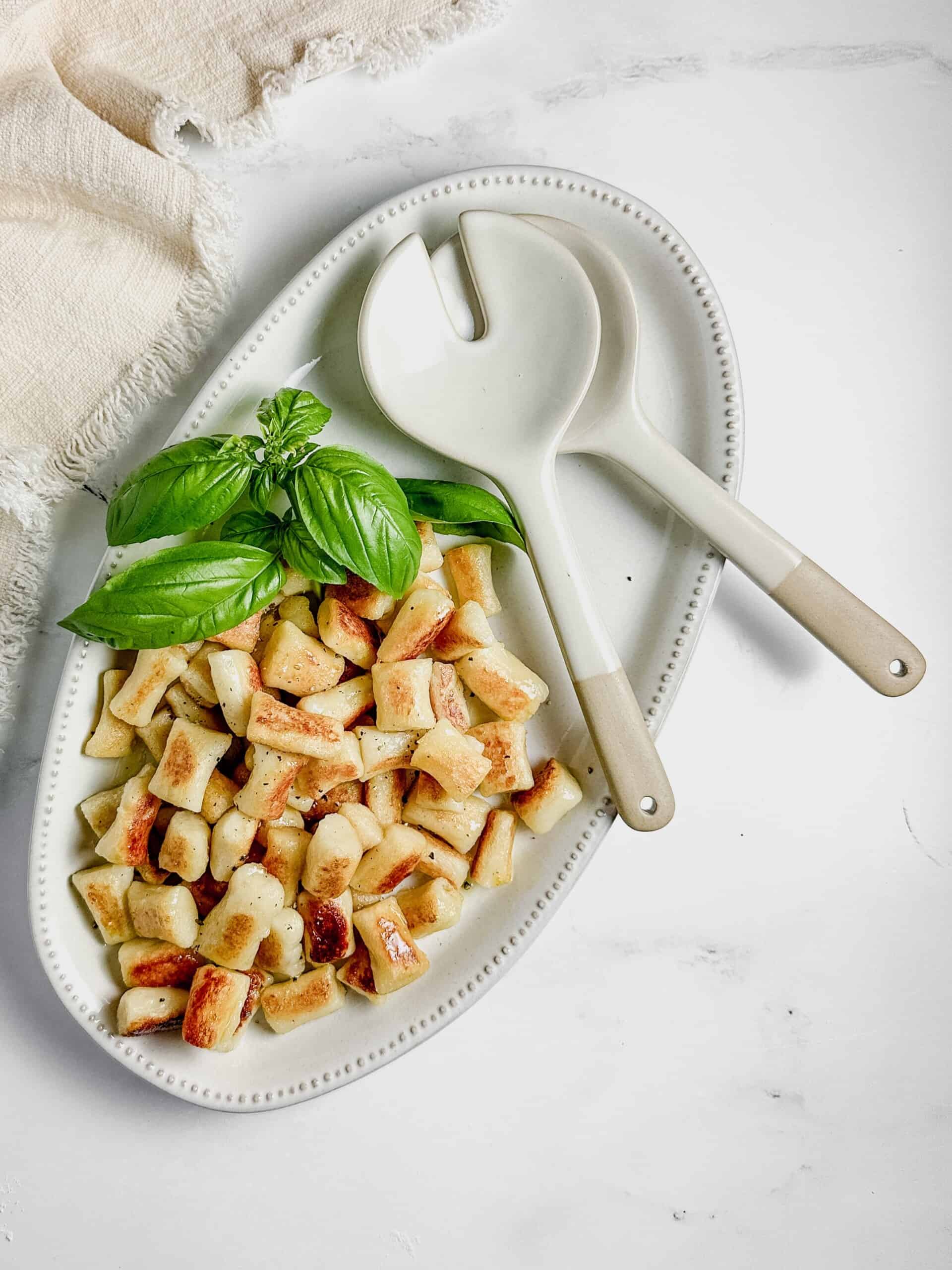Gnocchi with serving spoon.