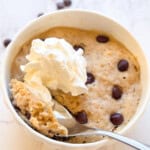 Oatmeal Mug Cake Close up with Whipcream on top