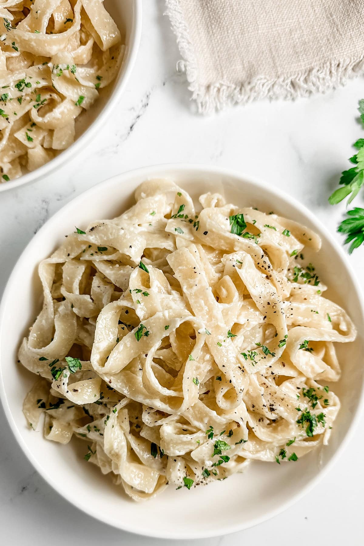 Bowl of Truffle Pasta garnished with parsley on top