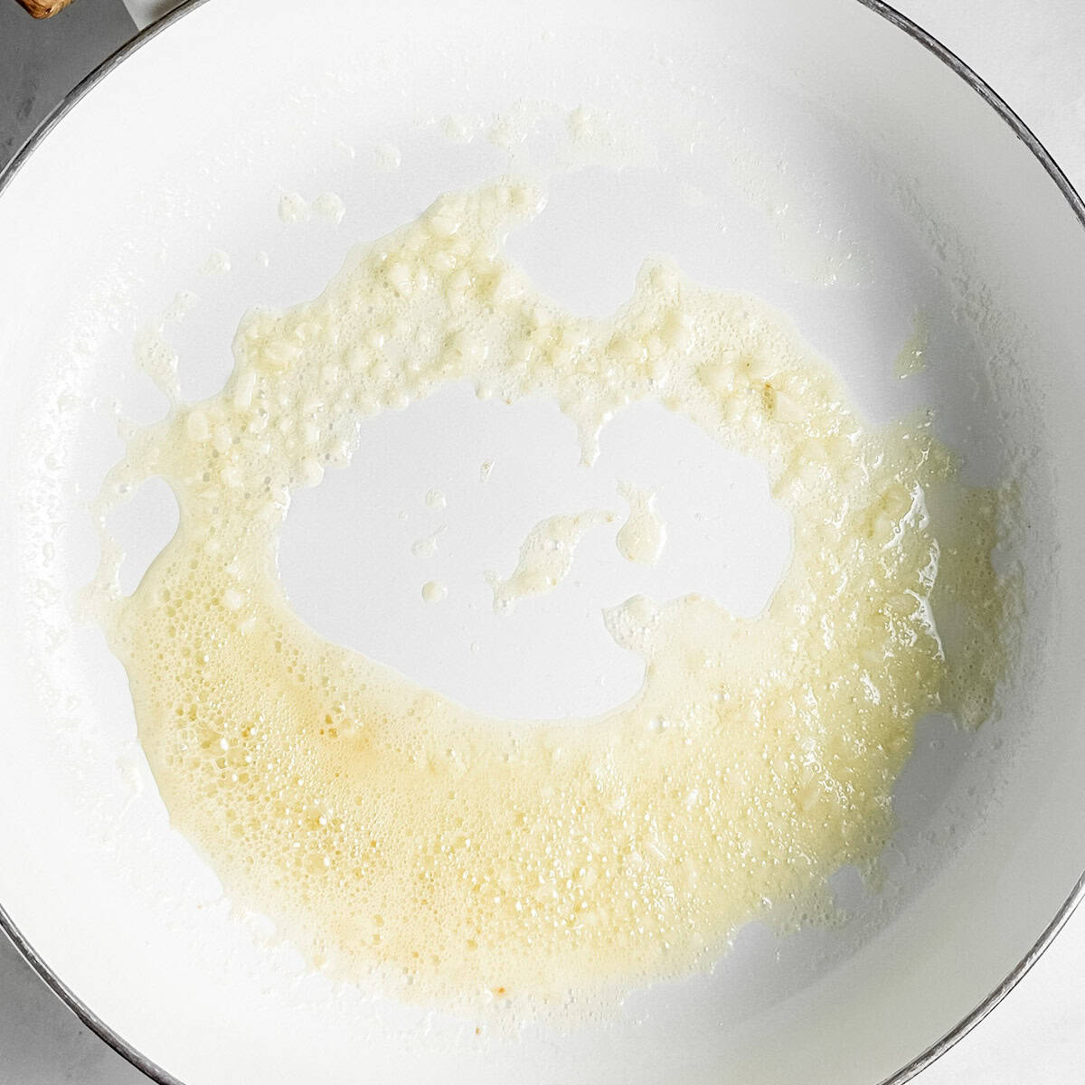 Step 1 to making the pasta - melt the butter in pan