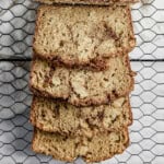 feature image - overhead shot of a loaf of gluten free cinnamon apple bread cut into slices