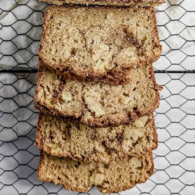 feature image - overhead shot of a loaf of gluten free cinnamon apple bread cut into slices