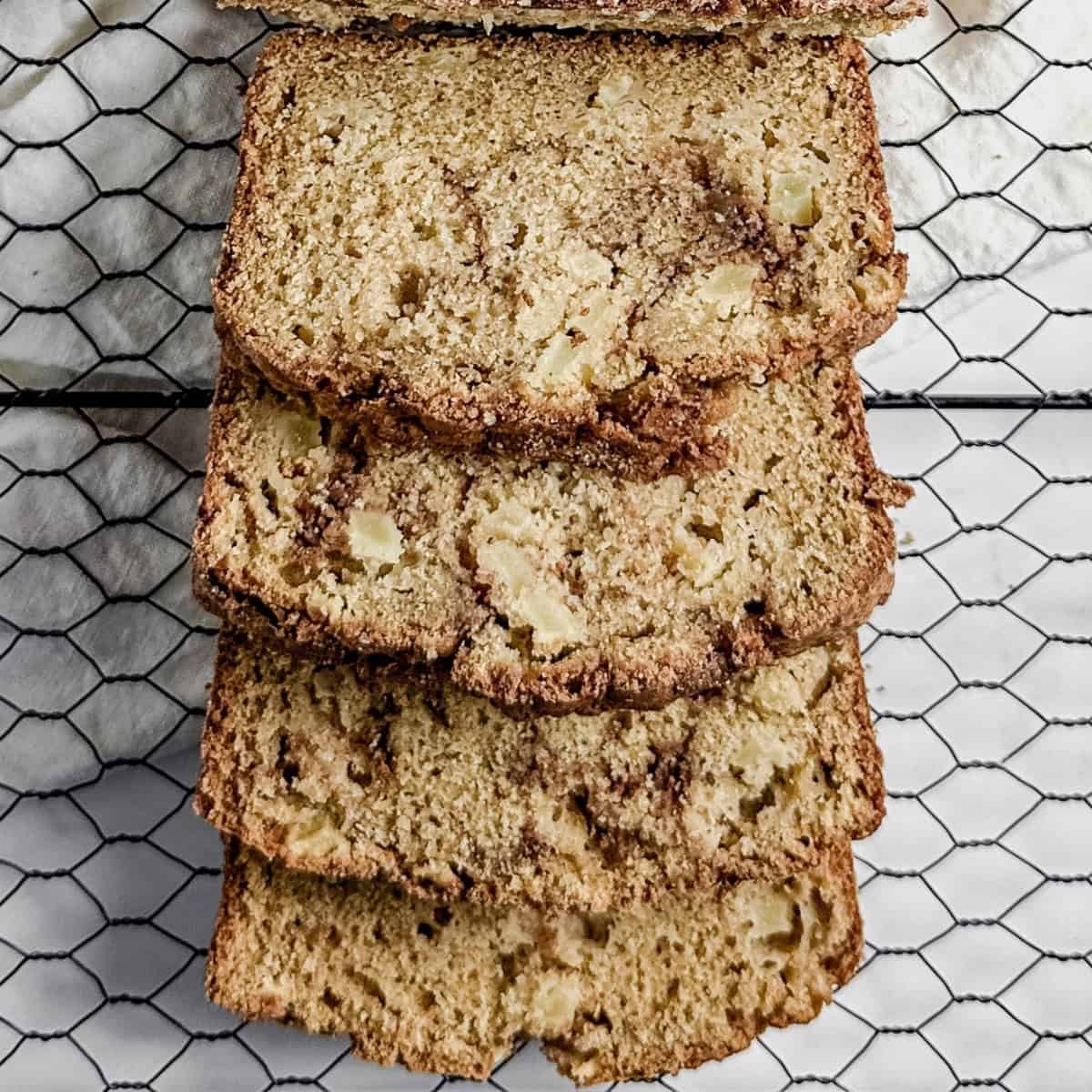 Featured Image - Overhead shot of sliced gluten-free cinnamon apple bread