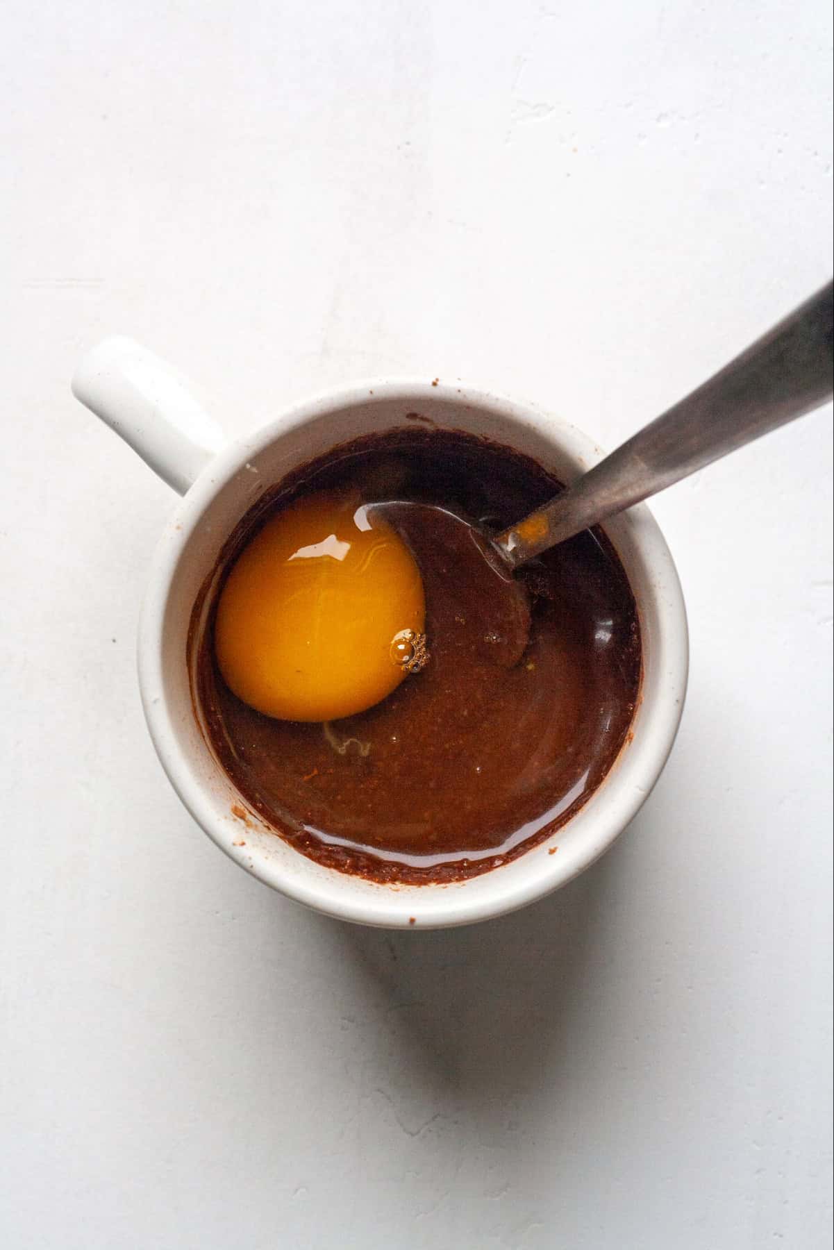 Step 1 - mix egg in with chocolate flour, oil, cocoa powder 