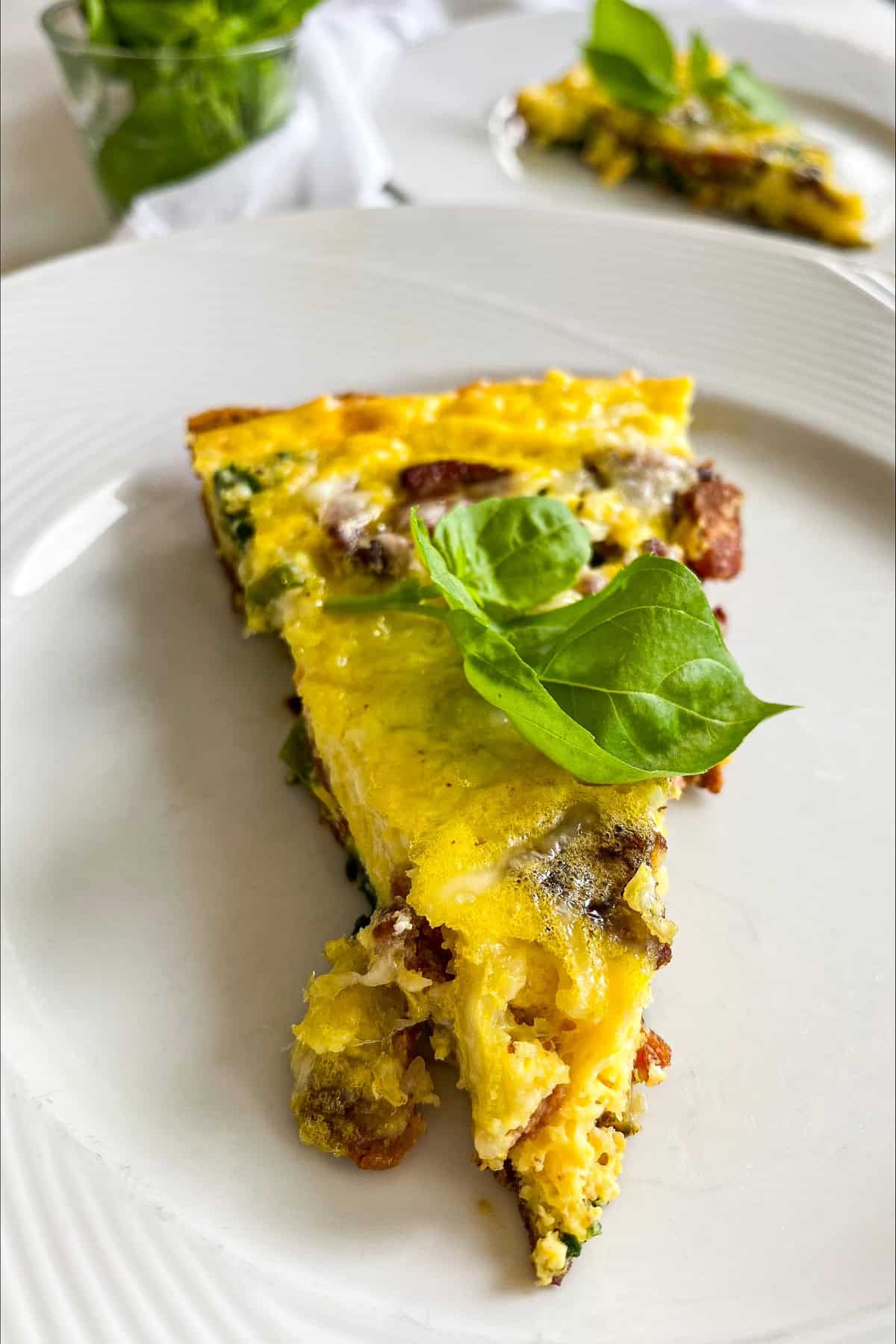 Frittata wedges sliced ​​on a white plate