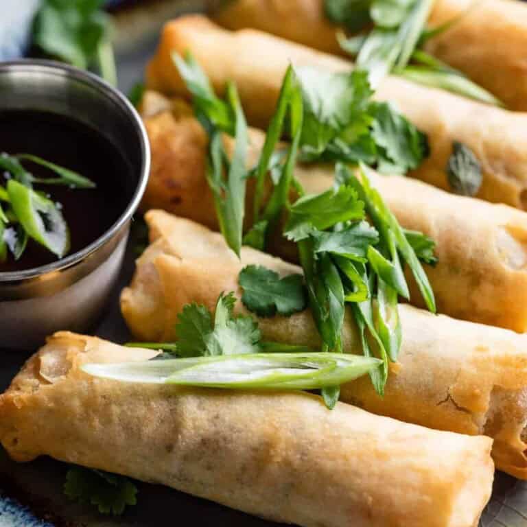 a line of Air Fryer Frozen Spring Rolls