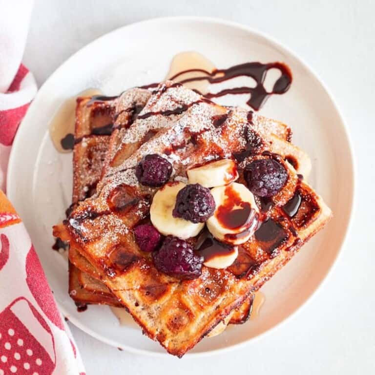 overhead of Chocolate Chip Waffles in a white plate