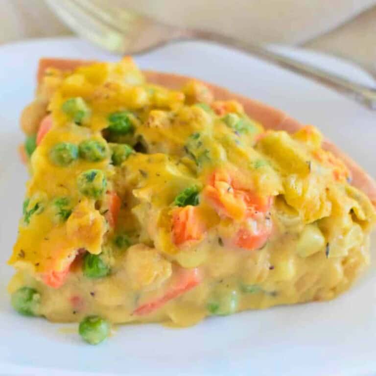 Slices of chickpea pot pie on a white plate