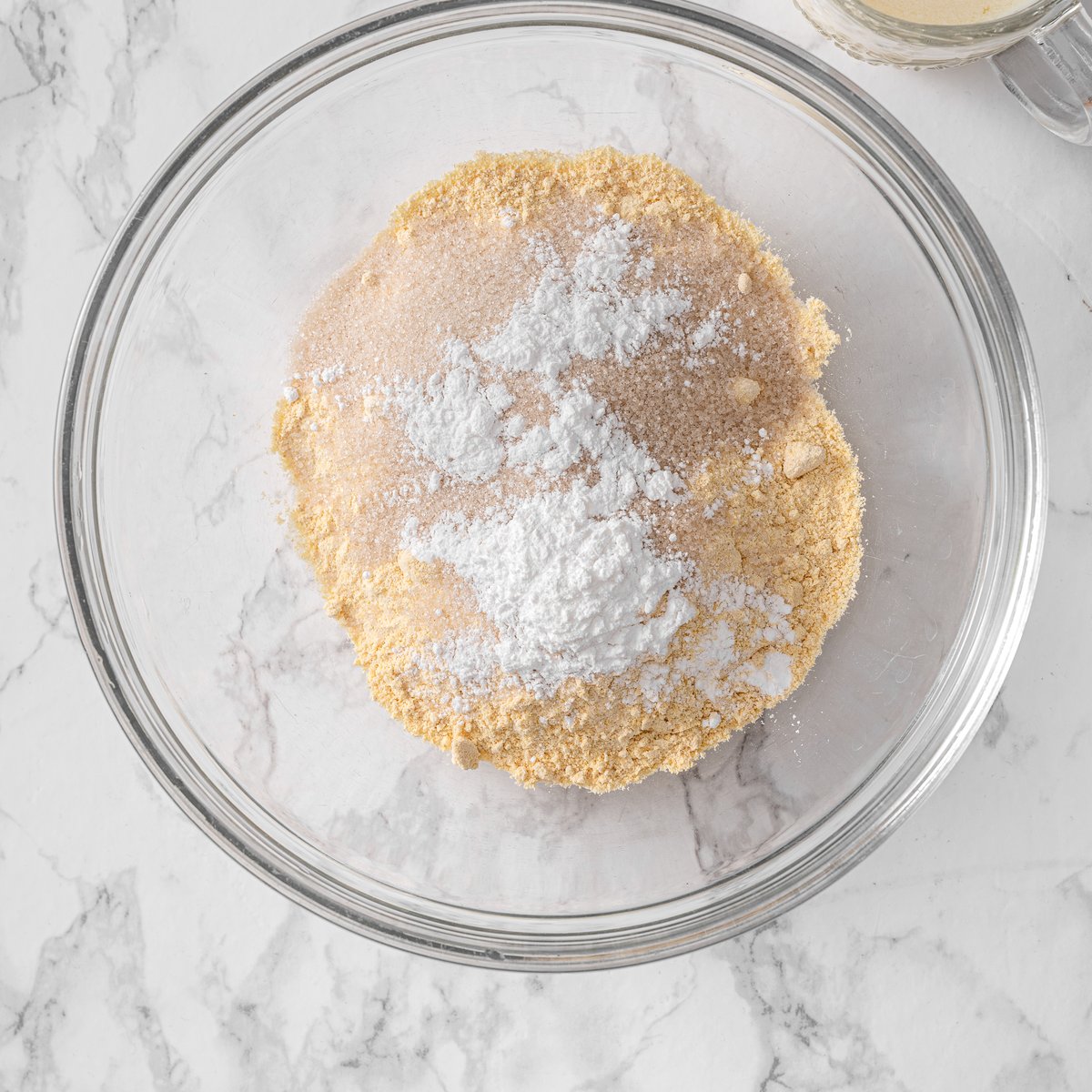 Bowl of dry ingredients including chickpea flour, baking powder