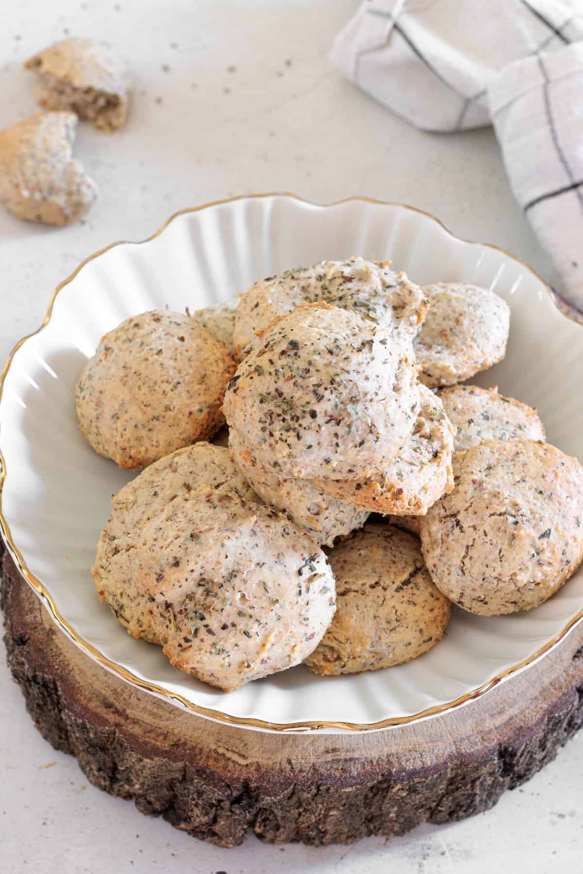 several almond flour biscuits served on a white plate 