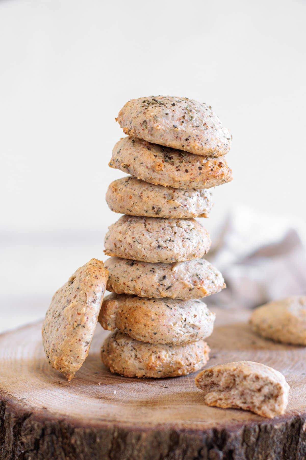 vertical stack of Golden baked vegan almond flour biscuits fresh from the oven