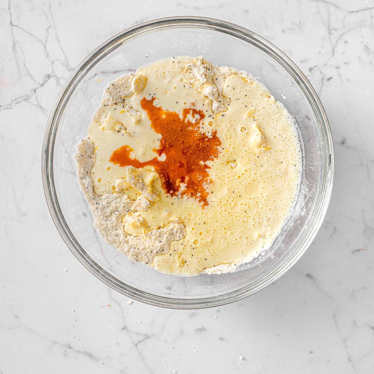 Make vegan lemon poppy seed scones by adding wet ingredients to dry ingredients